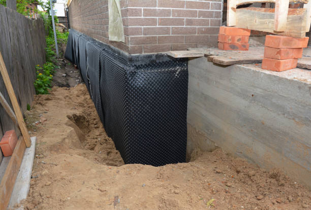 Happy homeowners after waterproofing job in Bliss